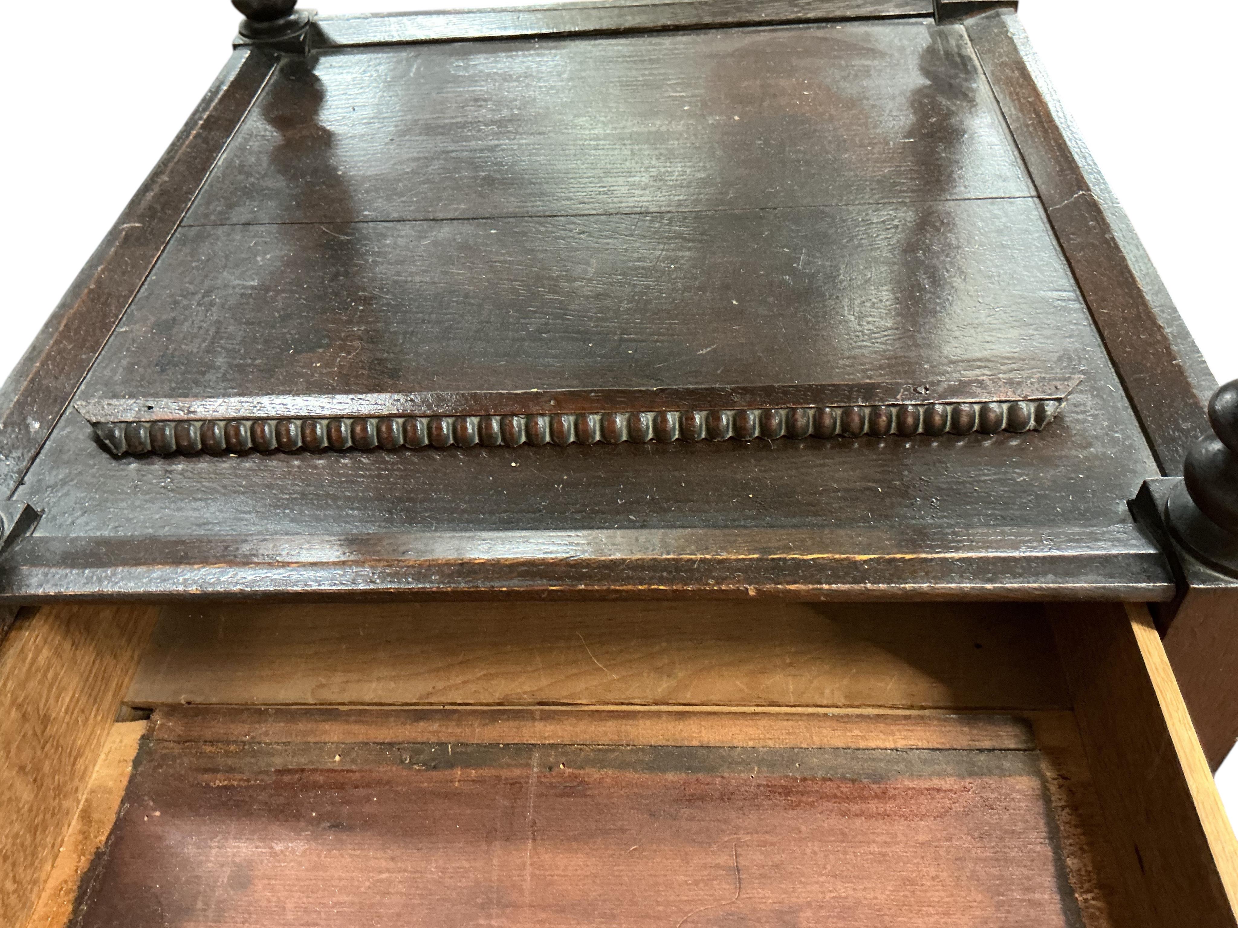 A Regency style oak three tier whatnot, width 46cm, height 136cm